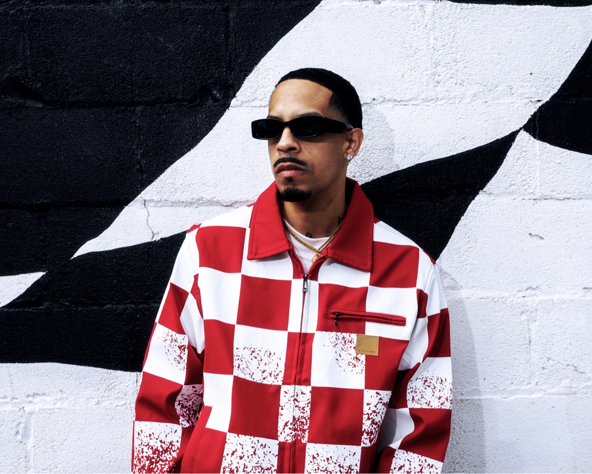 Checkered shirt against graphic wall