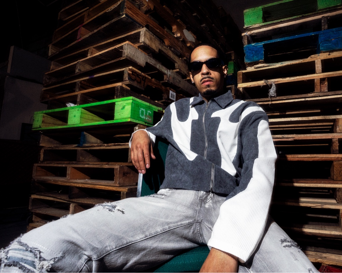 Patterned shirt among pallets