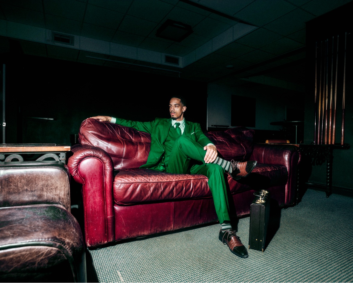 JoVann Pastor — green suit editorial