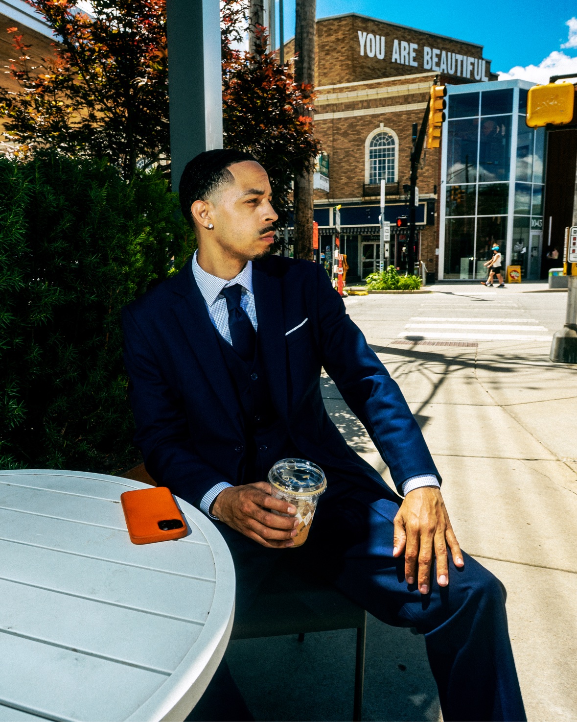 Navy suit at outdoor cafe