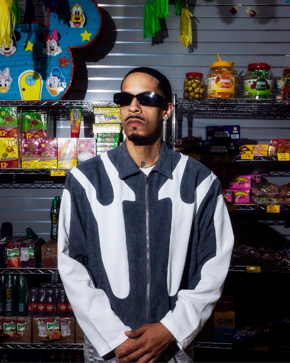 Colorblock corduroy jacket in a candy store